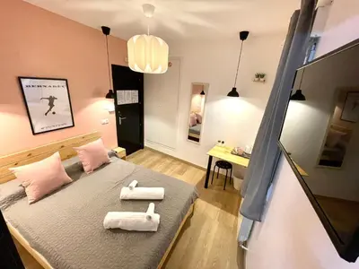 Cama o camas de una habitación en OPERA ROOMS