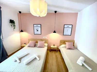 Cama o camas de una habitación en OPERA ROOMS