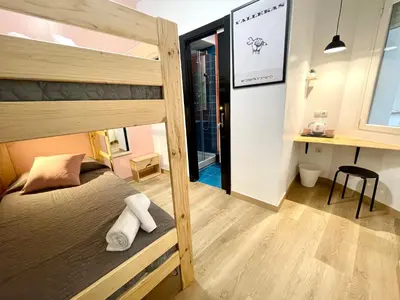 Cama o camas de una habitación en OPERA ROOMS