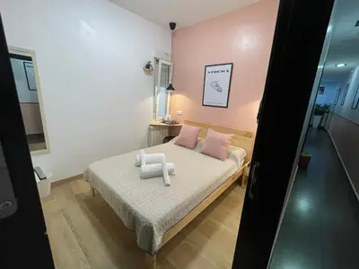 Cama o camas de una habitación en OPERA ROOMS
