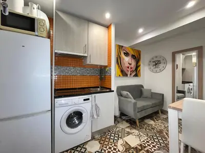 Una cocina o zona de cocina en Acogedor Piso Olivar Temporal