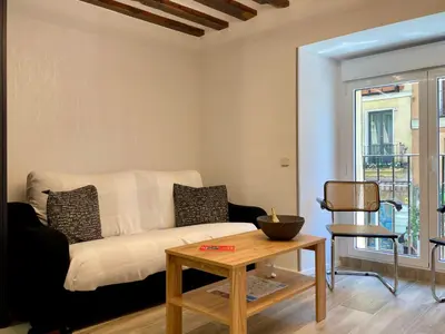 Zona de estar de Madrid Villa Suites Aquamarina