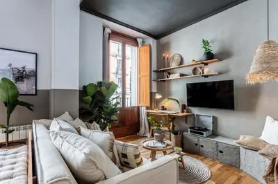 Una televisión o centro de entretenimiento en TETELA- 1 Bedroom Apartment with shared pool in Centro