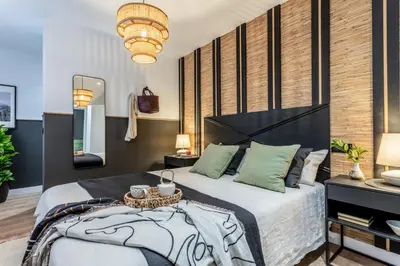 Cama o camas de una habitación en LUNDA- 2 Bedroom Apartment in Malasaña