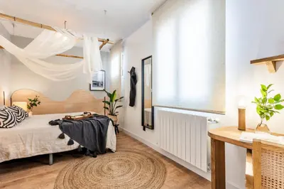 Cama o camas de una habitación en LUNDA- 2 Bedroom Apartment in Malasaña