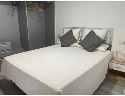 Cama o camas de una habitación en Madrid Villa Suites Bianco