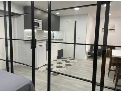 Una cocina o zona de cocina en Madrid Villa Suites Bianco