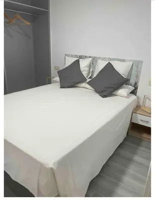 Cama o camas de una habitación en Madrid Villa Suites Bianco