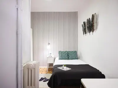 Cama o camas de una habitación en My City Home Habana I
