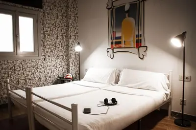 Cama o camas de una habitación en room00 Chueca Hostel