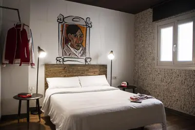 Cama o camas de una habitación en room00 Chueca Hostel