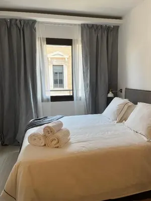 Cama o camas de una habitación en Luxury Studio Retiro Park & Prado Museum