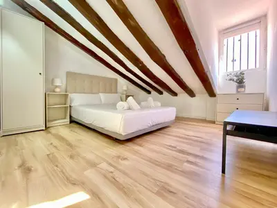 Cama o camas de una habitación en Malasaña Attic - In the city center