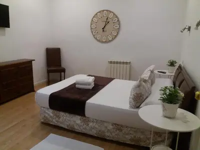 Cama o camas de una habitación en Casa de Huéspedes Prada