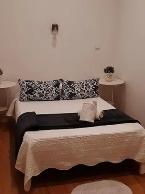 Cama o camas de una habitación en Casa de Huéspedes Prada