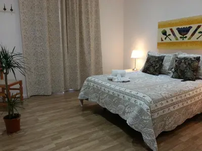 Cama o camas de una habitación en Casa de Huéspedes Prada
