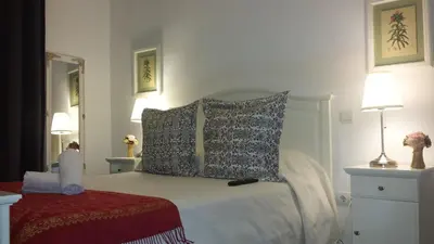Cama o camas de una habitación en Casa de Huéspedes Prada