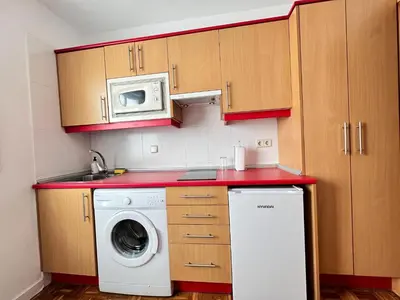 Una cocina o zona de cocina en Piso Augusto Acogedor 5 Temporal