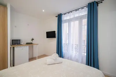 Cama o camas de una habitación en Room Plaza España