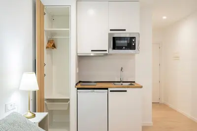 Una cocina o zona de cocina en Room Plaza España