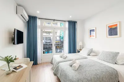 Cama o camas de una habitación en Room Plaza España