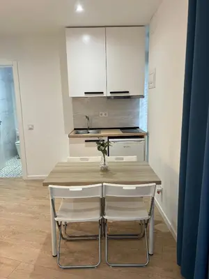 Una cocina o zona de cocina en Room Plaza España