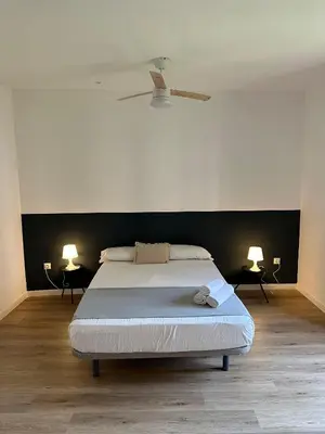 Cama o camas de una habitación en Casa de Huéspedes Mi lla