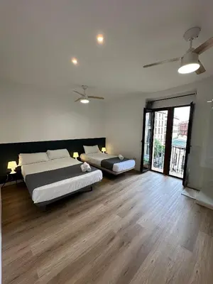 Cama o camas de una habitación en Casa de Huéspedes Mi lla