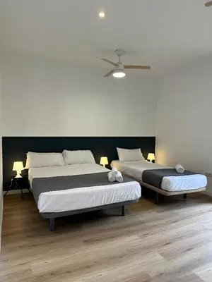 Cama o camas de una habitación en Casa de Huéspedes Mi lla