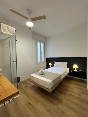 Cama o camas de una habitación en Casa de Huéspedes Mi lla