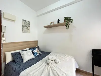 Cama o camas de una habitación en Estudio Augusto Acogedor 2 Temporal
