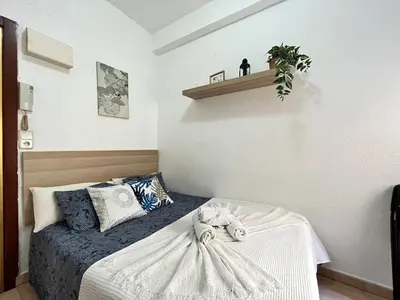 Cama o camas de una habitación en Estudio Augusto Acogedor 2 Temporal