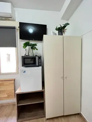 Una cocina o zona de cocina en Estudio Augusto Acogedor 2 Temporal