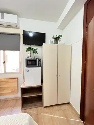 Una cocina o zona de cocina en Estudio Augusto Acogedor 2 Temporal