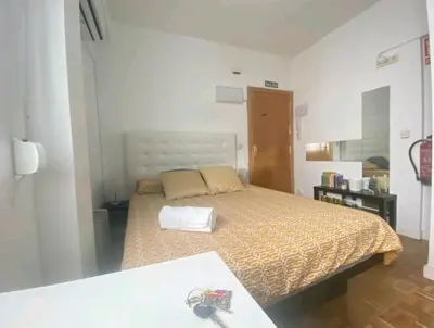 Cama o camas de una habitación en Estudio Acogedor chueca