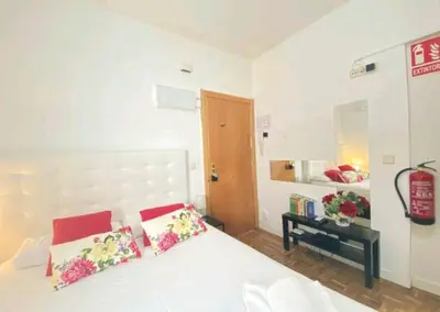 Cama o camas de una habitación en Estudio Acogedor chueca