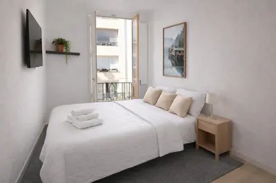 Cama o camas de una habitación en Habitaciones Parque Retiro y Movistar Arena