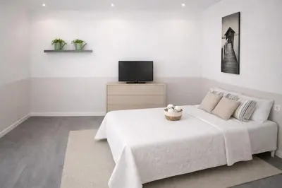 Cama o camas de una habitación en Habitaciones Parque Retiro y Movistar Arena
