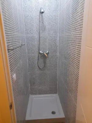 Un baño de Espoz habitaciones