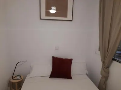 Cama o camas de una habitación en Espoz habitaciones