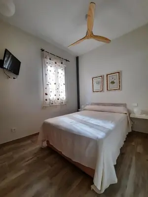 Cama o camas de una habitación en La Casita de Vallecas