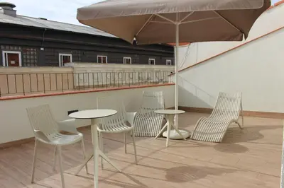 Un balcón o terraza de Apartamentos Centro Jardines