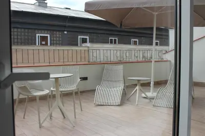 Un balcón o terraza de Apartamentos Centro Jardines