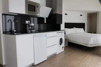 Una cocina o zona de cocina en Apartamentos Centro Jardines