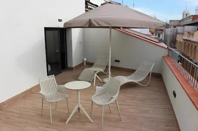 Un balcón o terraza de Apartamentos Centro Jardines
