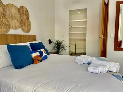 Cama o camas de una habitación en Apartamento con terraza en el centro de Madrid