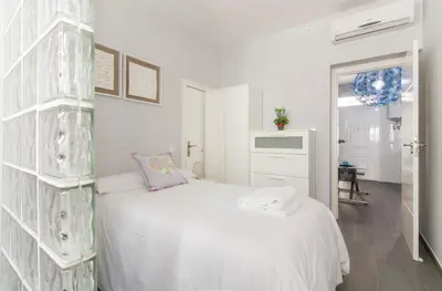 Cama o camas de una habitación en FANTÁSTICO APARTAMENTO MADRID RIÓ-PUERTA DEL ÁNGEL