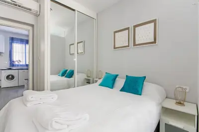 Cama o camas de una habitación en FANTÁSTICO APARTAMENTO MADRID RIÓ-PUERTA DEL ÁNGEL
