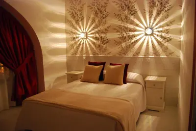 Cama o camas de una habitación en Hostal PETITE MAMAN