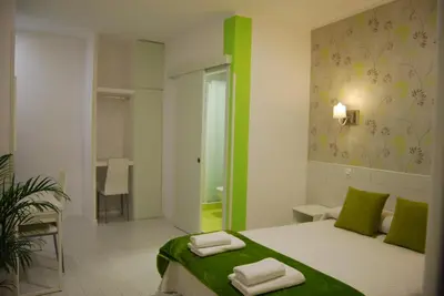 Cama o camas de una habitación en Hostal PETITE MAMAN